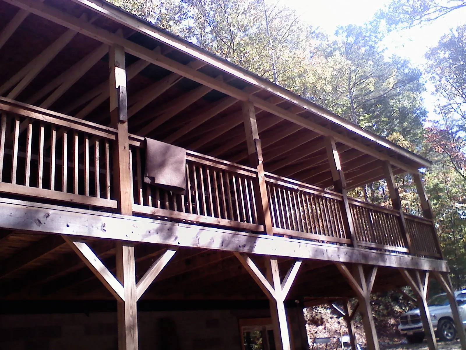 Timber framing under a new elevated porch and deck — Roof Leak Repair in Leota by Roofing Brothers